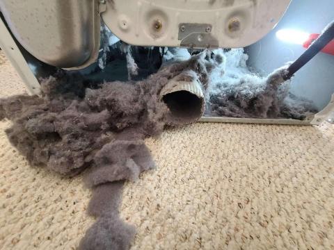 Lint from Dryer connecting to Dryer Vent  in Toronto